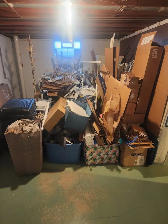 Roll-off dumpster container at job site for 8 Yard Dumpster Rental in East Moline